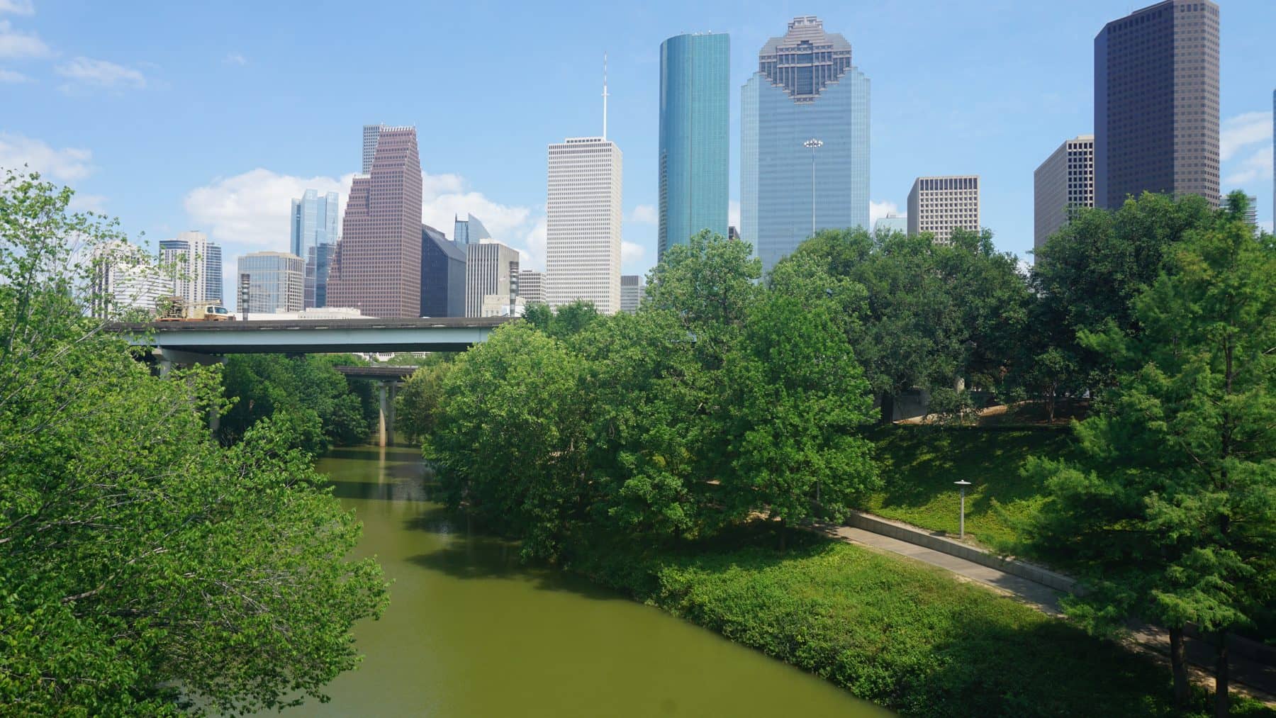 Buffalo Bayou Park with the downtown Houston skyline behind it